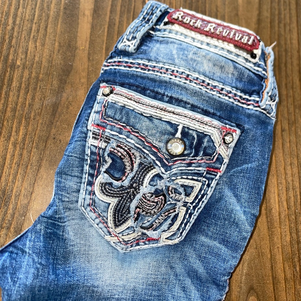 Rock Revival Distressed Blue Jeans with Embroidered Pockets